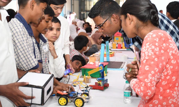 Students displaying their models at a STEM Fest in Hyderabad
