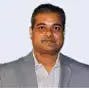 Dr. Suman De