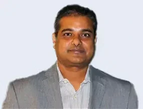 Dr. Suman De