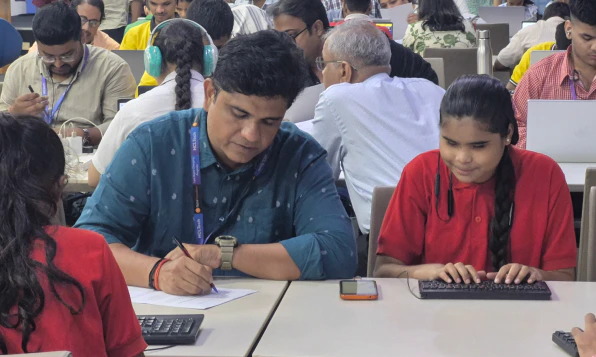 Visually-impaired students exhibiting their computer proficiency skills in HCLTech Noida campus