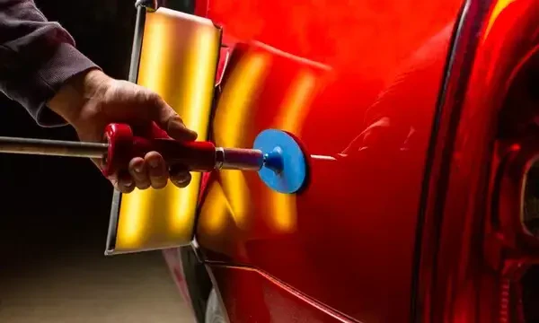 Dent resistance simulation on automotive closures using oil canning method